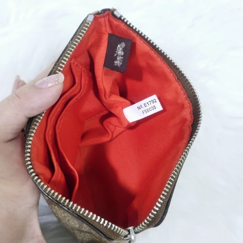 Coach Monogram Wristlet